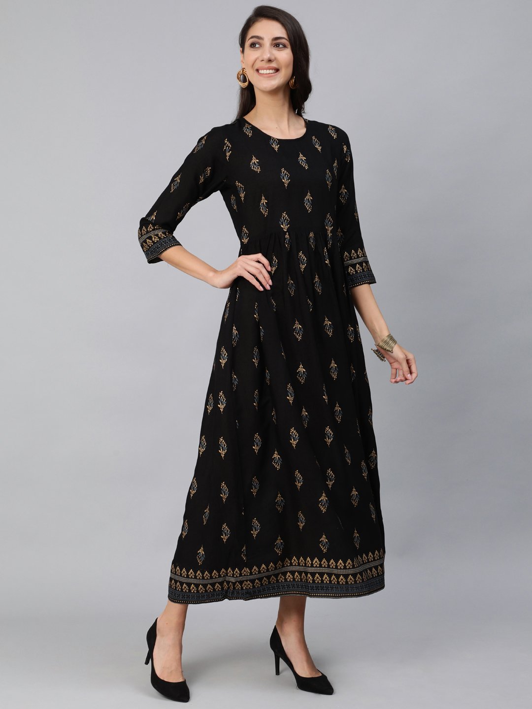 Women Black & Gold Printed Maxi Dress With Three Quarter Sleeves | NOZ2TOZ - Made In INDIA.