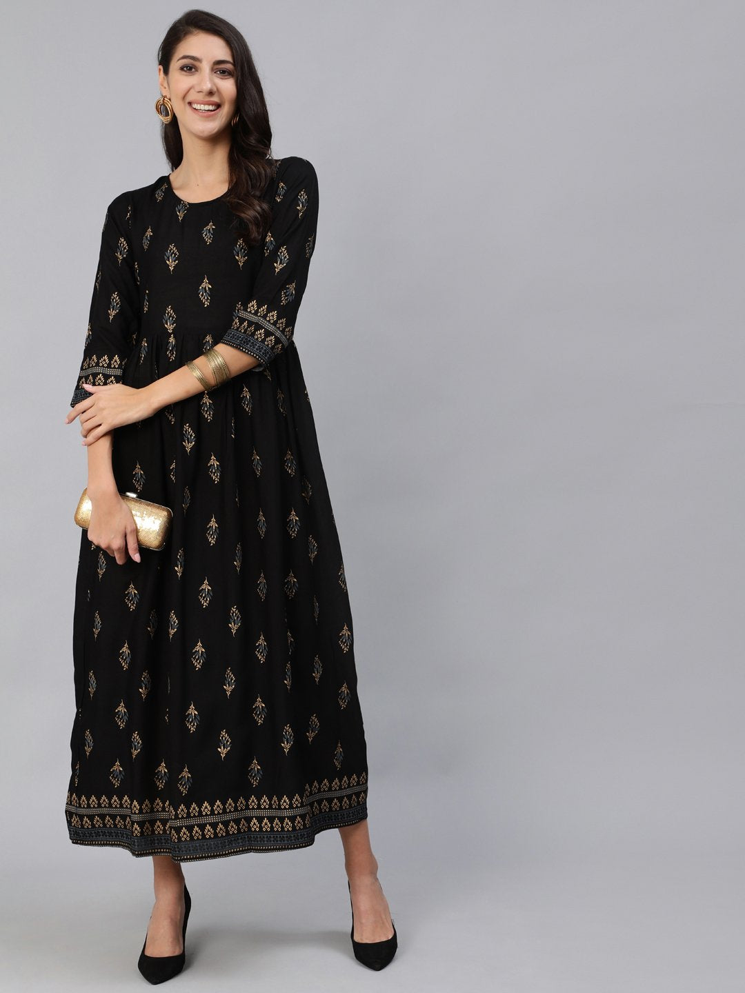 Women Black & Gold Printed Maxi Dress With Three Quarter Sleeves | NOZ2TOZ - Made In INDIA.