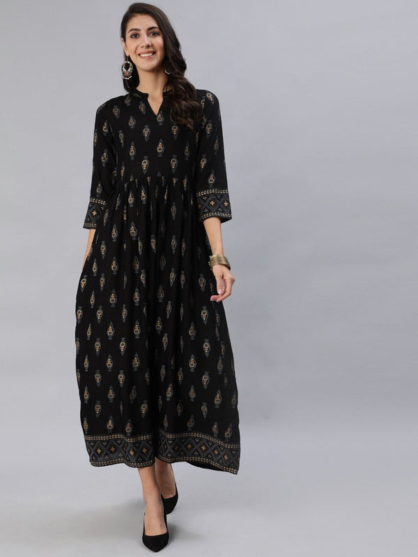 Women Black & Gold Printed Maxi Dress With Three Quarter Sleeves | NOZ2TOZ - Made In INDIA.