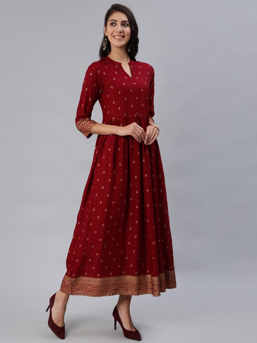 Women Maroon & Gold Printed Maxi Dress With Three Quarter Sleeves | NOZ2TOZ - Made In INDIA.