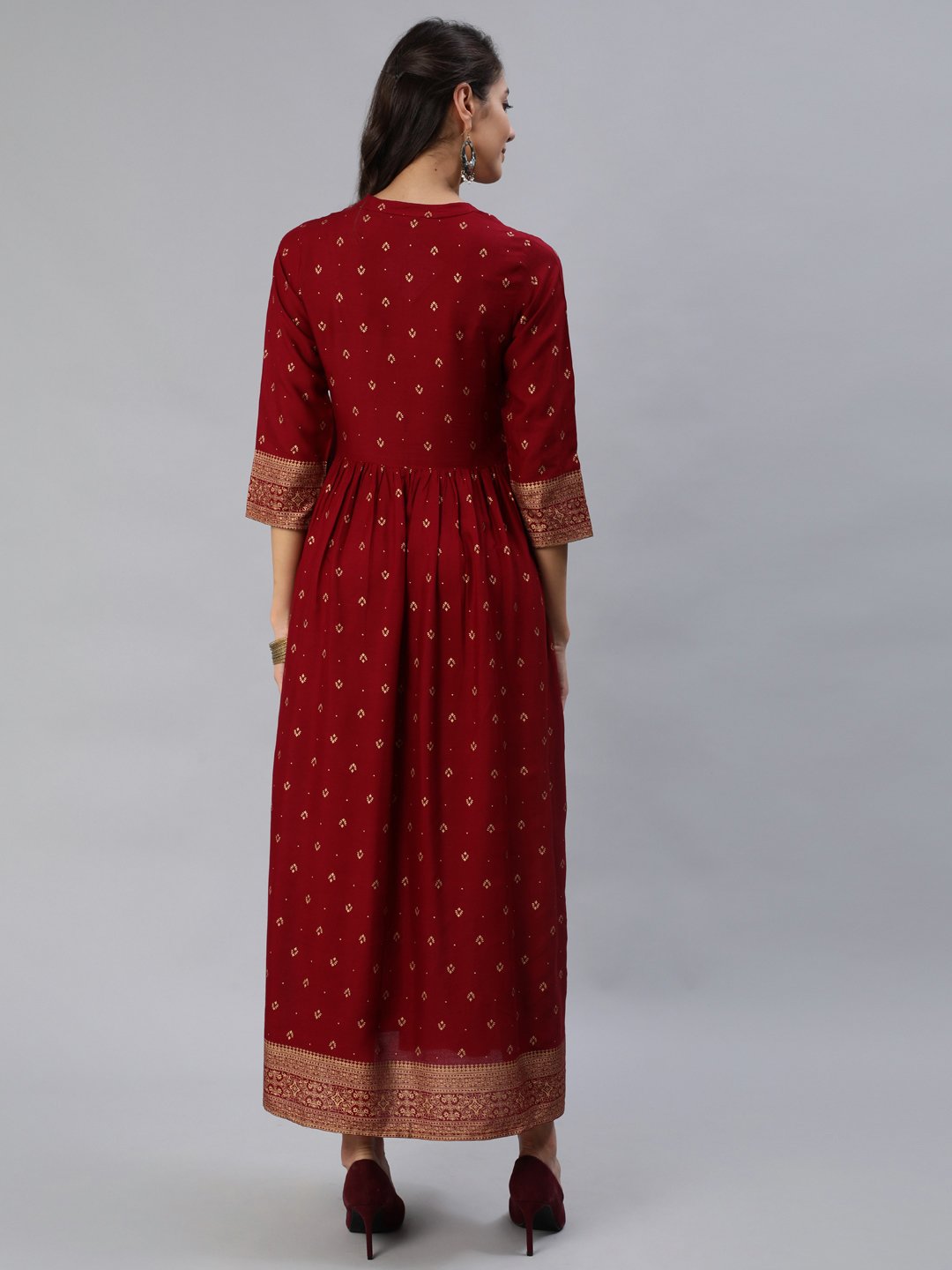 Women Maroon & Gold Printed Maxi Dress With Three Quarter Sleeves | NOZ2TOZ - Made In INDIA.