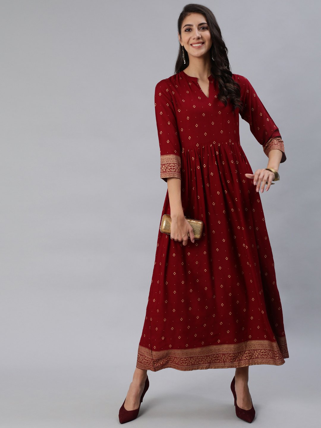 Women Maroon & Gold Printed Maxi Dress With Three Quarter Sleeves | NOZ2TOZ - Made In INDIA.