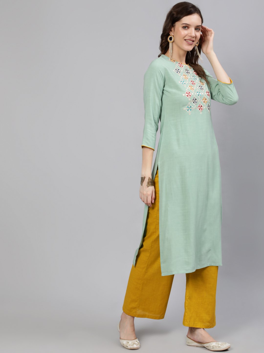 Women Green Embroidered Straight Kurta With Three Quarter Sleeves | NOZ2TOZ - Made In INDIA.