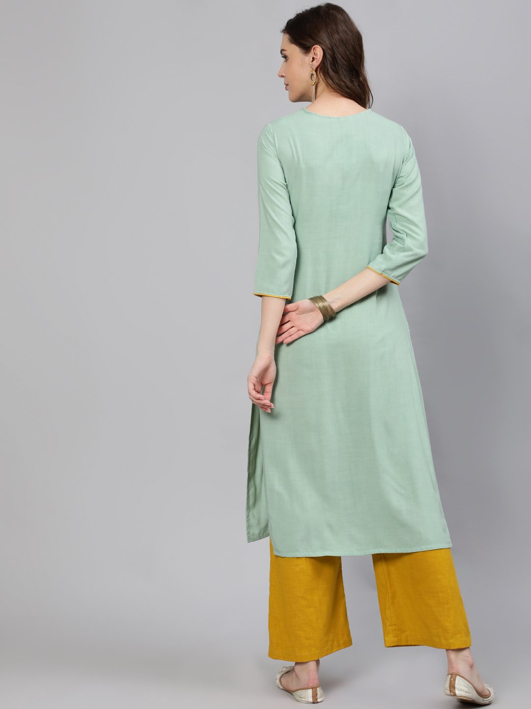 Women Green Embroidered Straight Kurta With Three Quarter Sleeves | NOZ2TOZ - Made In INDIA.