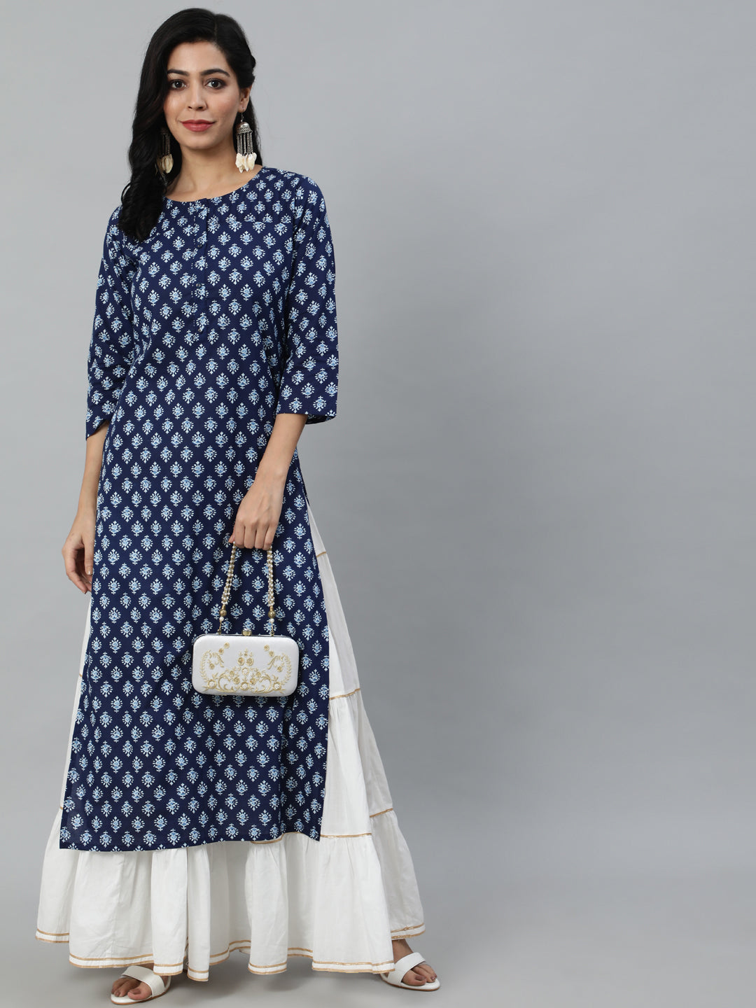 Women Navy Blue Ethnic Printed Straight Kurta With Three Quarter Sleeves | NOZ2TOZ - Made In INDIA.