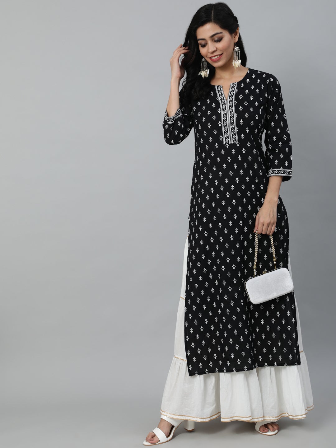 Women Black Calf Length Straight Kurta With Round Neck And Three Quarter Sleeves | NOZ2TOZ - Made In INDIA.