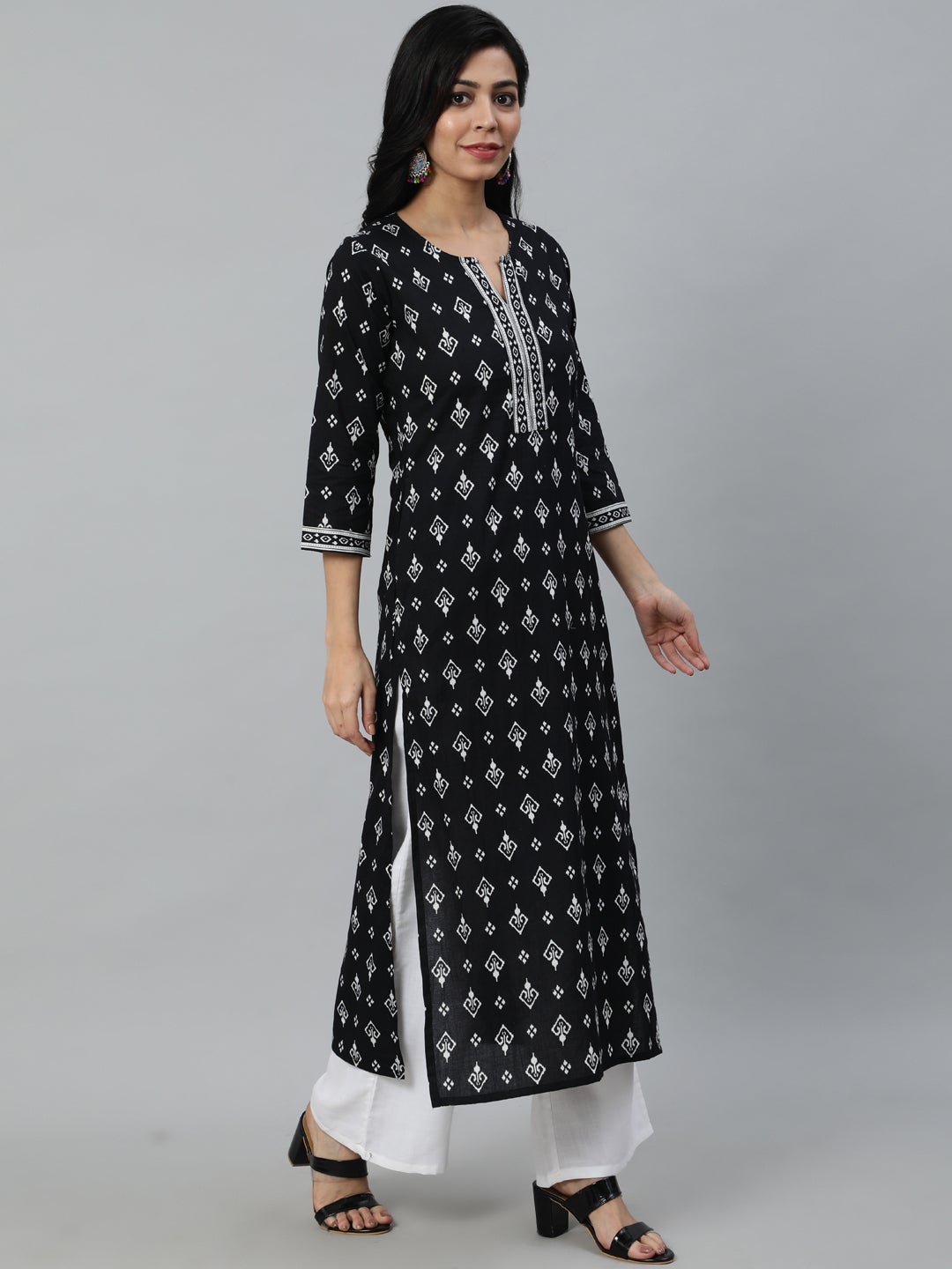 Women Black Printed Straight Kurta With Three Quarter Sleeves | NOZ2TOZ - Made In INDIA.