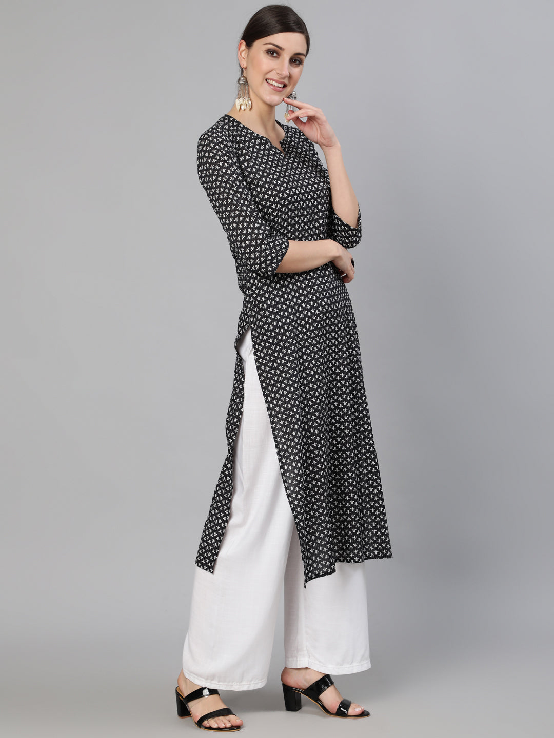 Women Black Abstrac Printed Straight Kurta With Three Quarter Sleeves | NOZ2TOZ - Made In INDIA.