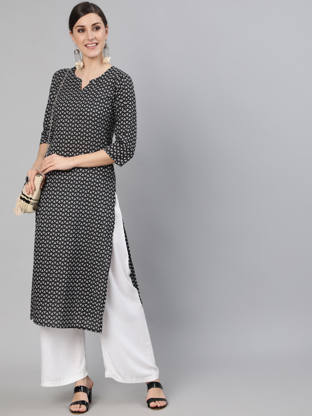 Women Black Abstrac Printed Straight Kurta With Three Quarter Sleeves | NOZ2TOZ - Made In INDIA.