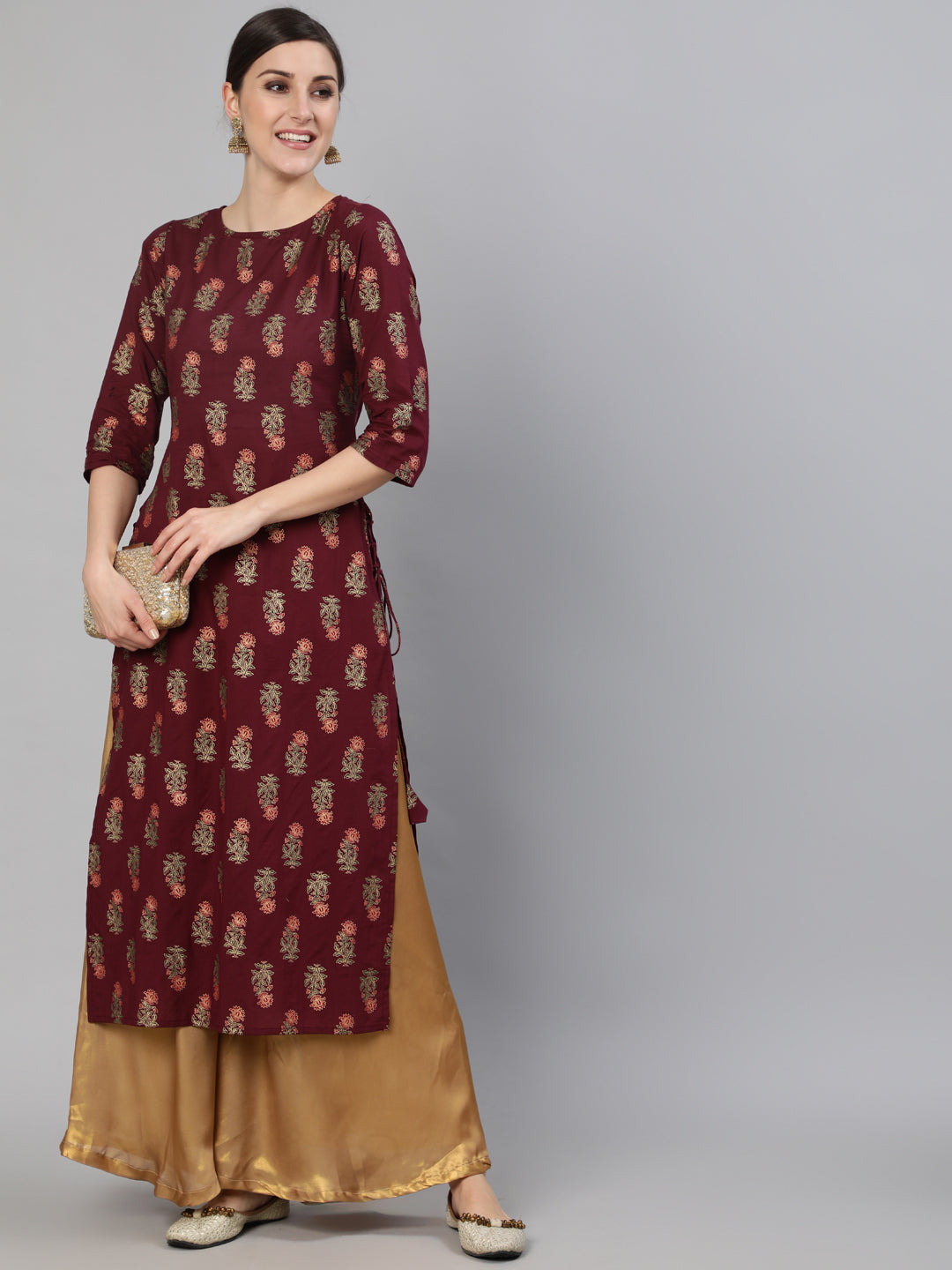 Women Burgundy Floral Printed Kurta with Tassel Detail | NOZ2TOZ - Made In INDIA.