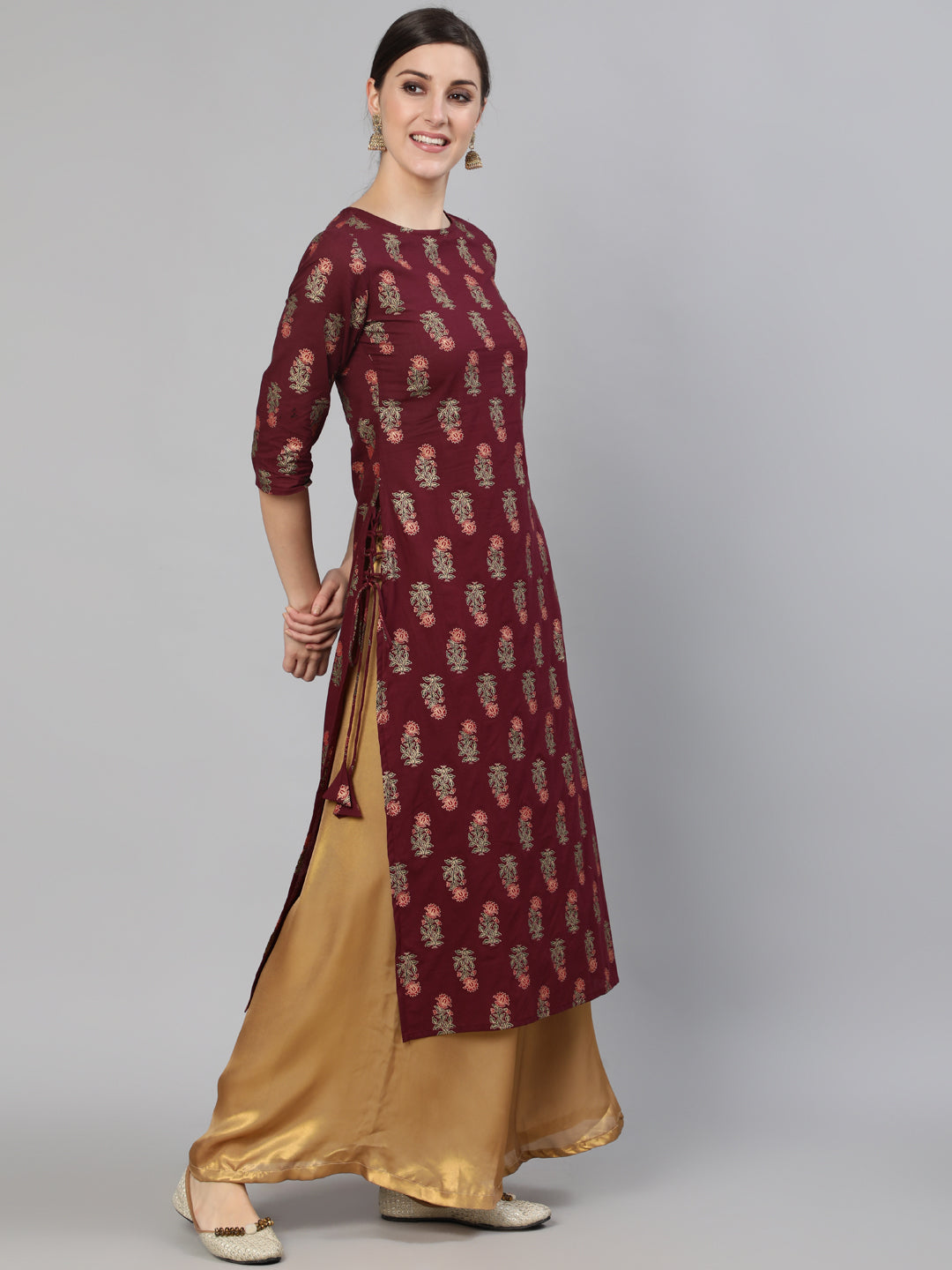 Women Burgundy Floral Printed Kurta with Tassel Detail | NOZ2TOZ - Made In INDIA.