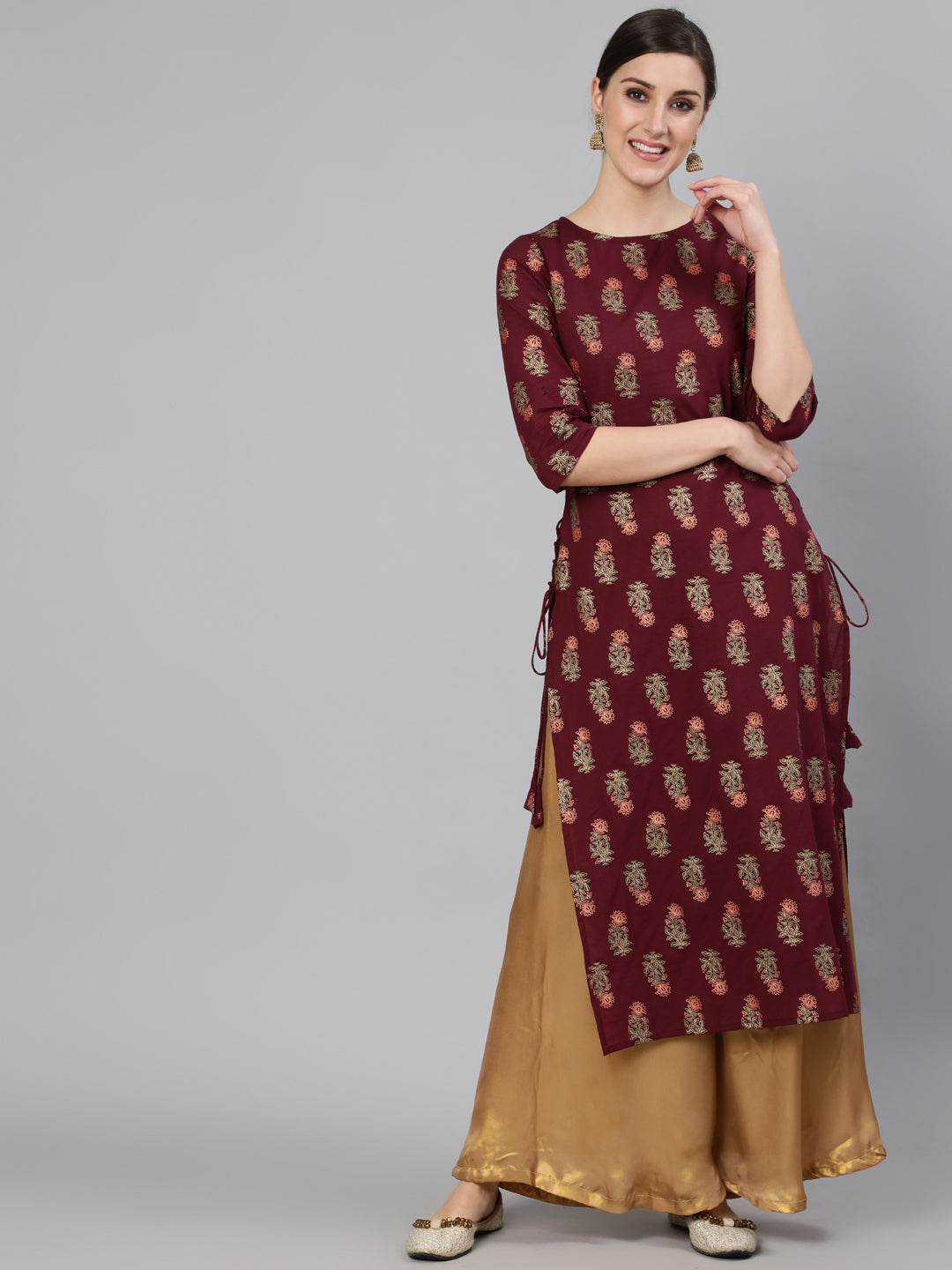 Women Burgundy Floral Printed Kurta with Tassel Detail | NOZ2TOZ - Made In INDIA.