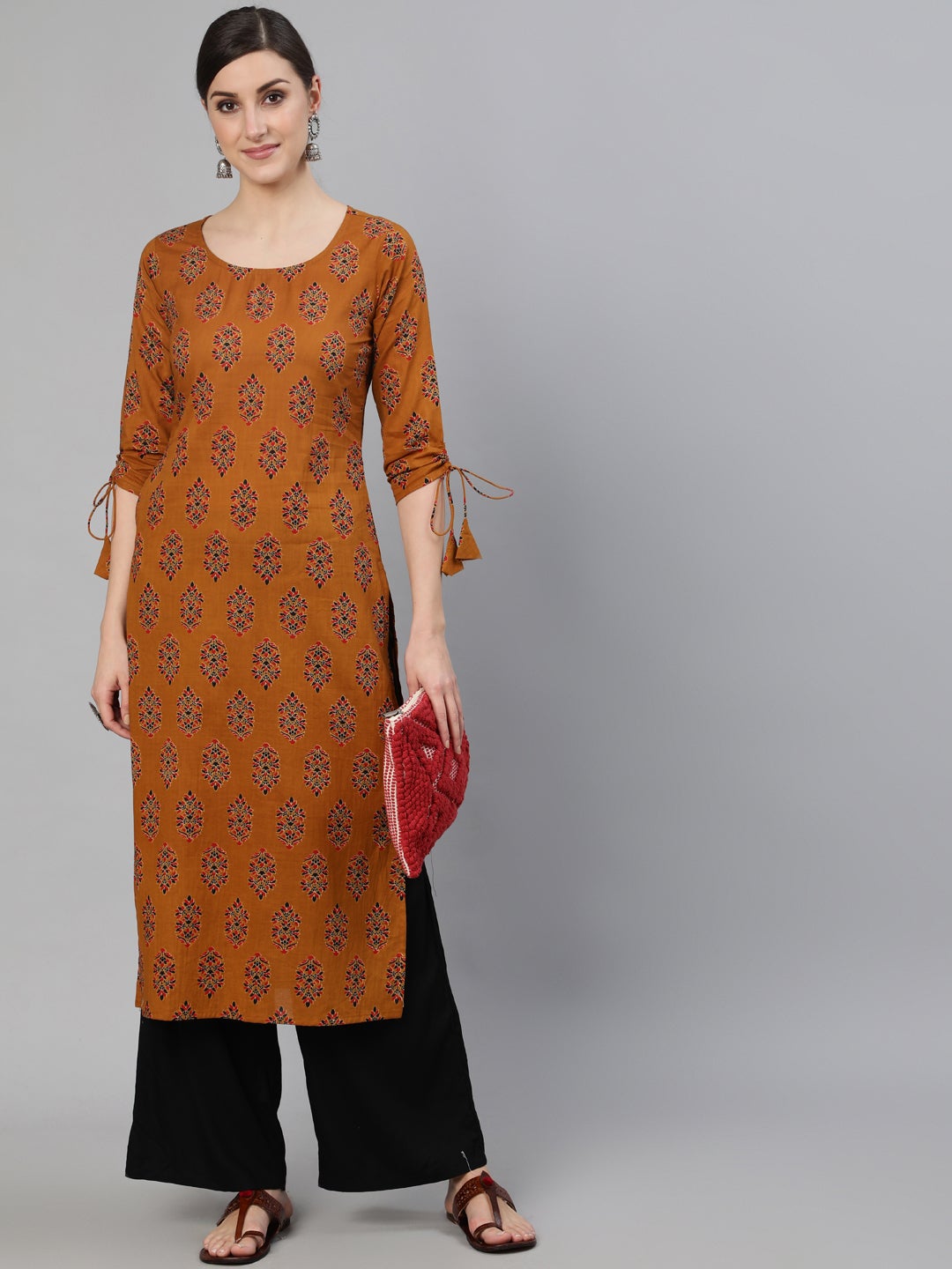 Women Mustard Ethnic Motifs Printed Straight Kurta With Tassel Detail | NOZ2TOZ - Made In INDIA.