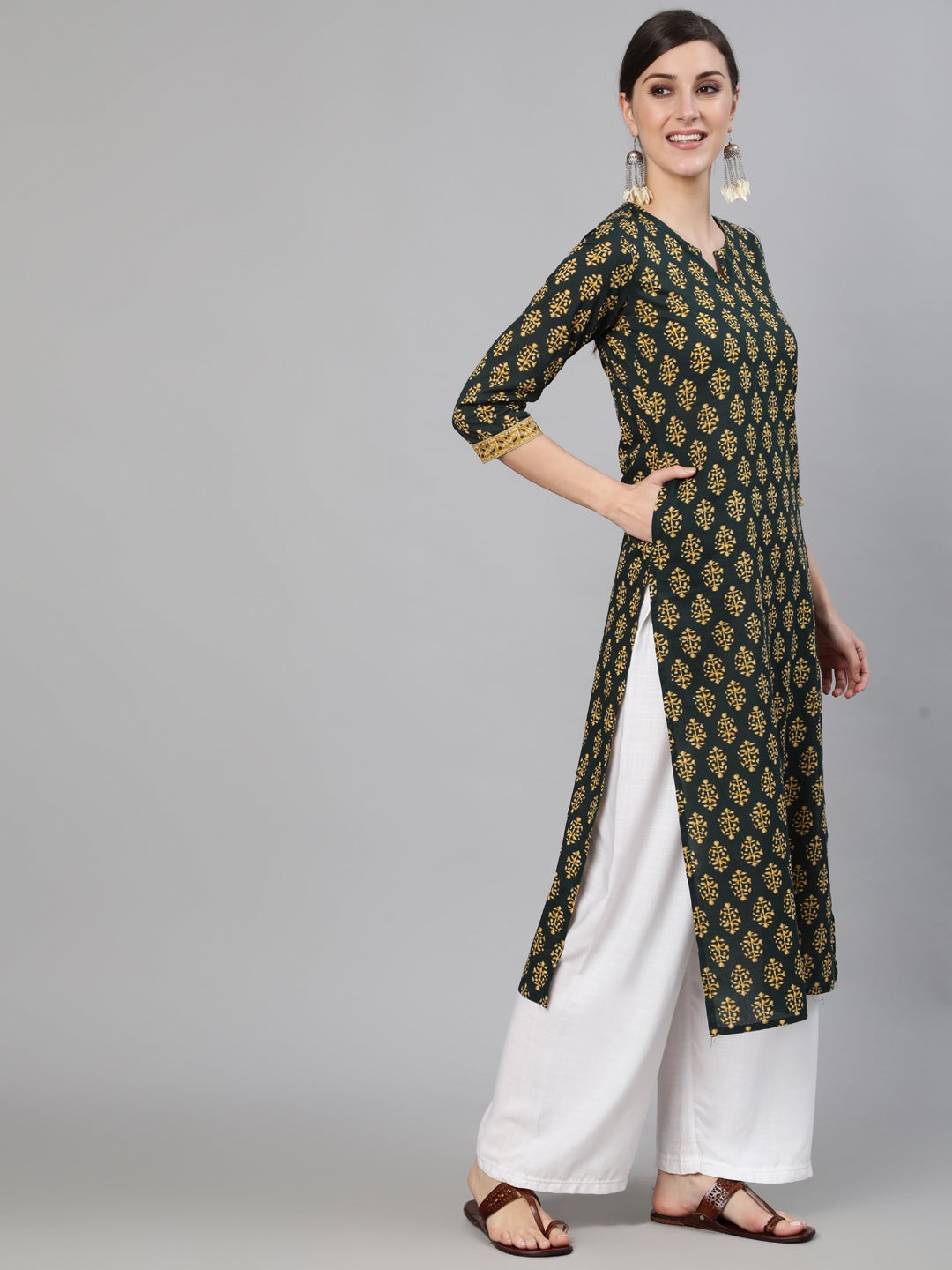 Women Green Ethnic Printed Straight Kurta with Three Quarter Sleeves | NOZ2TOZ - Made In INDIA.