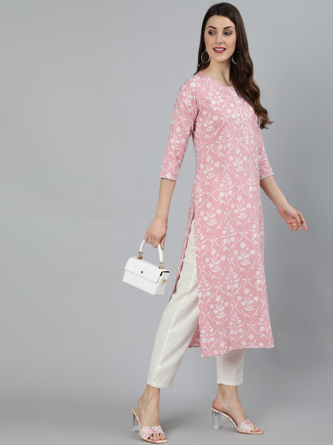 Women Pink Floral Printed Kurta With Three Quarter Sleeves | NOZ2TOZ - Made In INDIA.