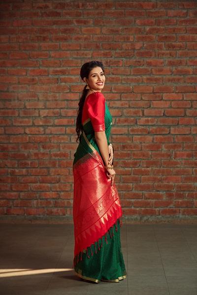 Dark-Green Silk Checked Designer Saree From Suvidha