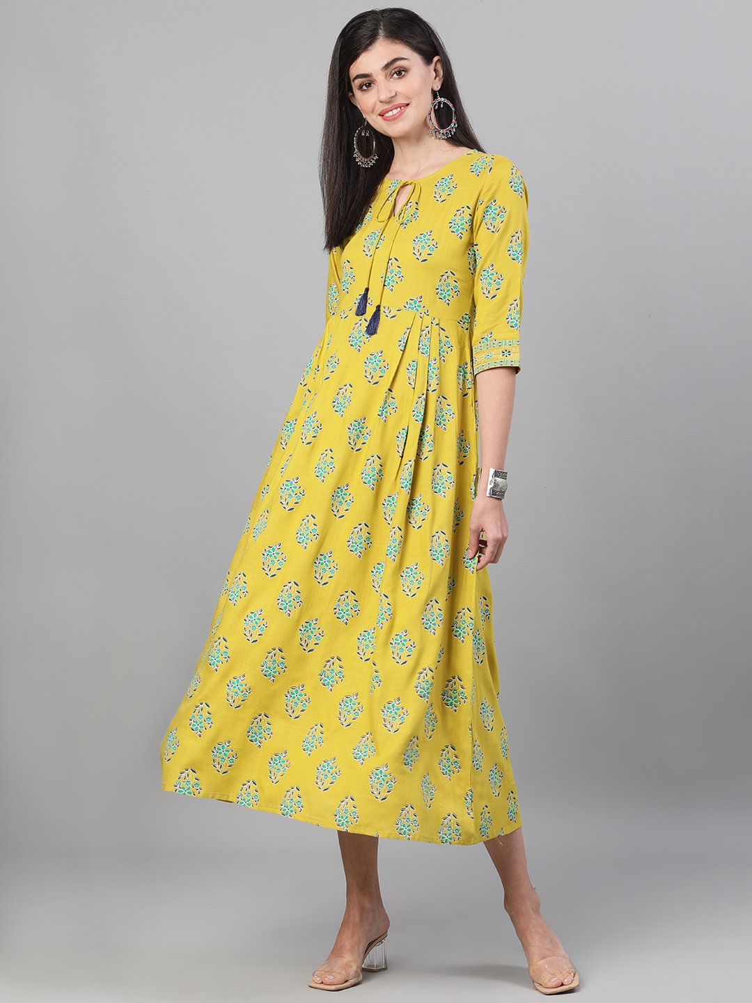 Women Green Printed Round Neck Viscose Rayon Fit and Flare Dress with pockets | NOZ2TOZ - Made In INDIA.