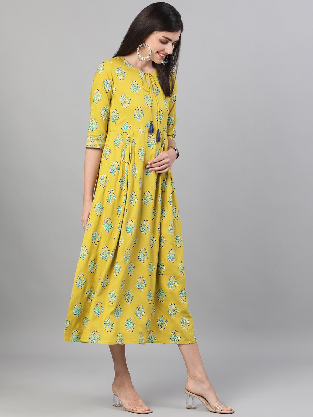 Women Green Printed Round Neck Viscose Rayon Fit and Flare Dress with pockets | NOZ2TOZ - Made In INDIA.