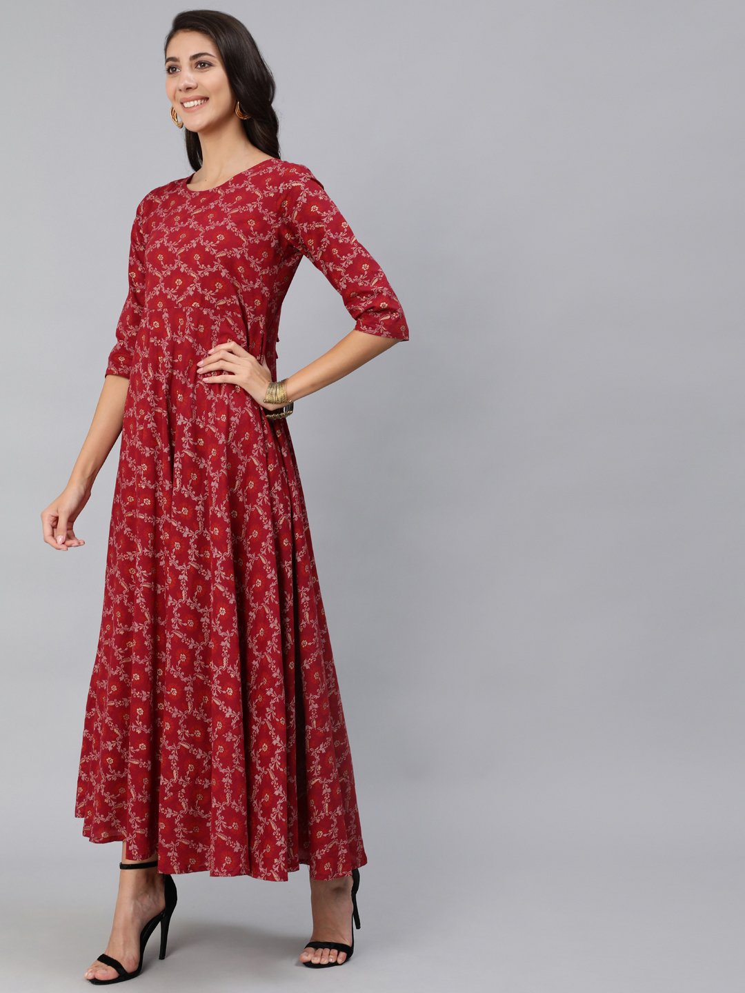 Women Burgundy & Gold Printed Maxi Dress With Three Quarter Sleeves | NOZ2TOZ - Made In INDIA.