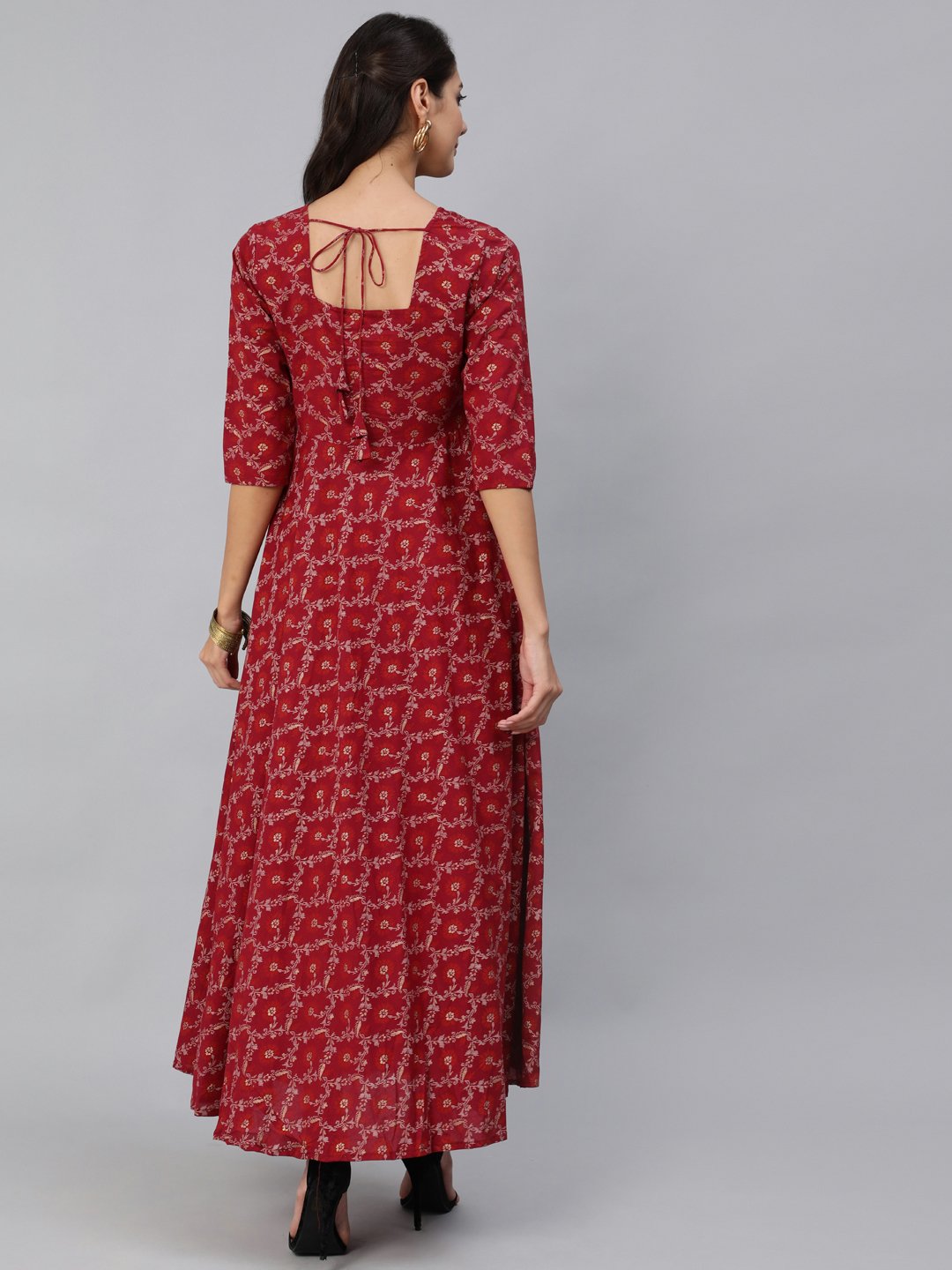 Women Burgundy & Gold Printed Maxi Dress With Three Quarter Sleeves | NOZ2TOZ - Made In INDIA.