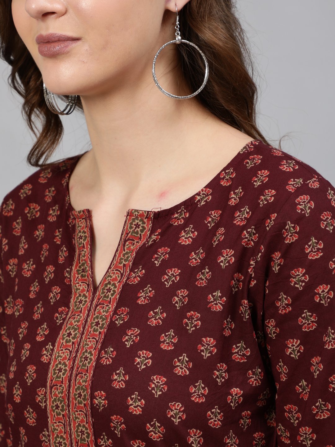 Women Burgundy Printed Tunic With Three Quarter Sleeves | NOZ2TOZ - Made In INDIA.