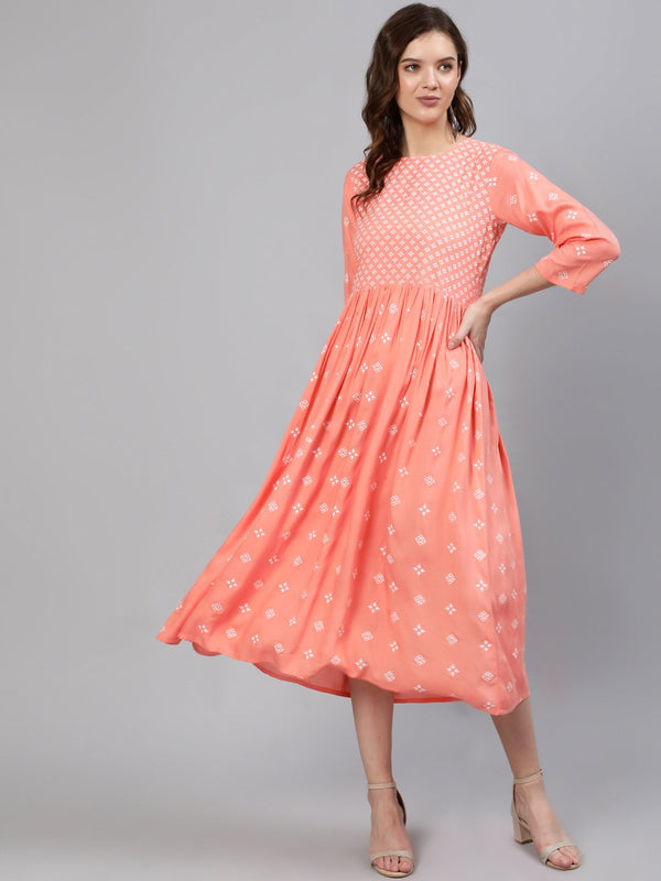 Women Peach Printed Dress With Three Quarter Sleeves | NOZ2TOZ - Made In INDIA.