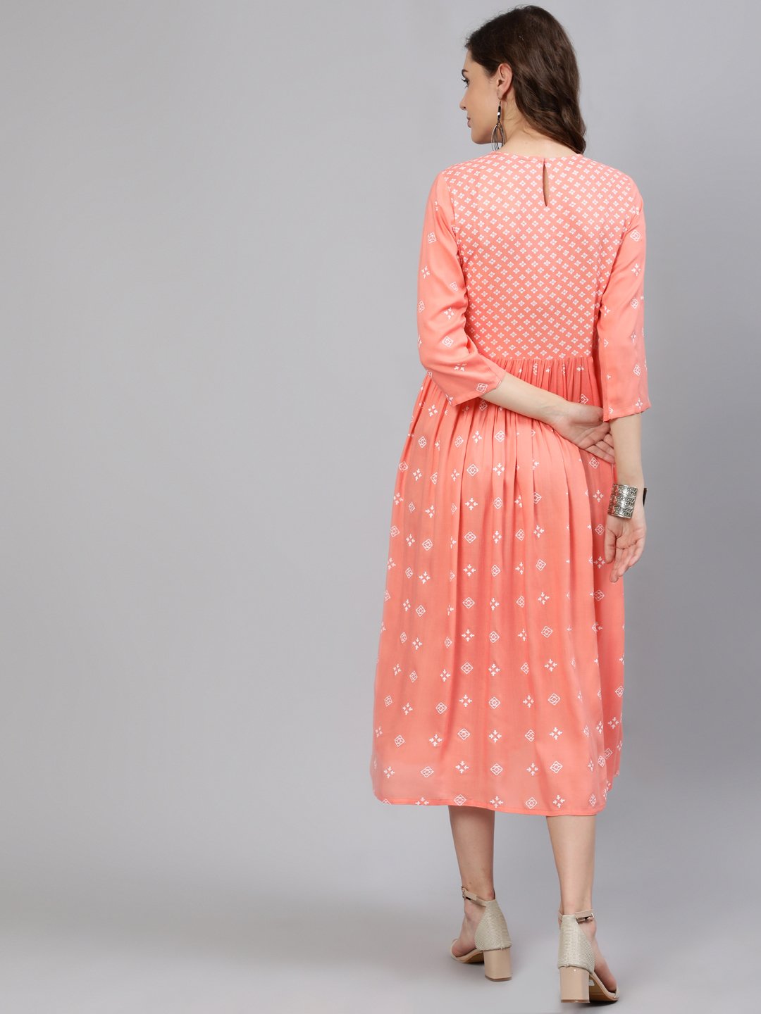 Women Peach Printed Dress With Three Quarter Sleeves | NOZ2TOZ - Made In INDIA.