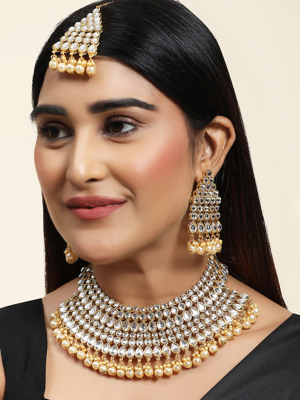 Women's Kundan Stone Gold Plated Traditional Brass Bridal Jewellery Set with Maangtika earring - Anikas Creation