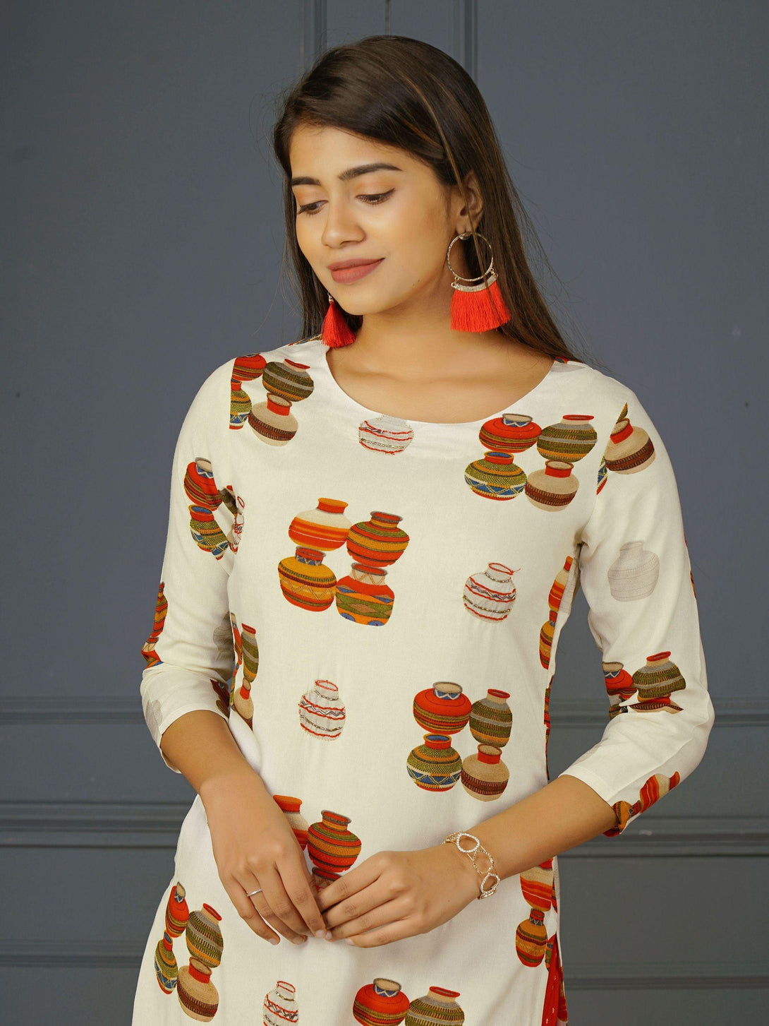 Vibrant Pot Printed Kurti with Cut-dana Embellishments - Indiakreations