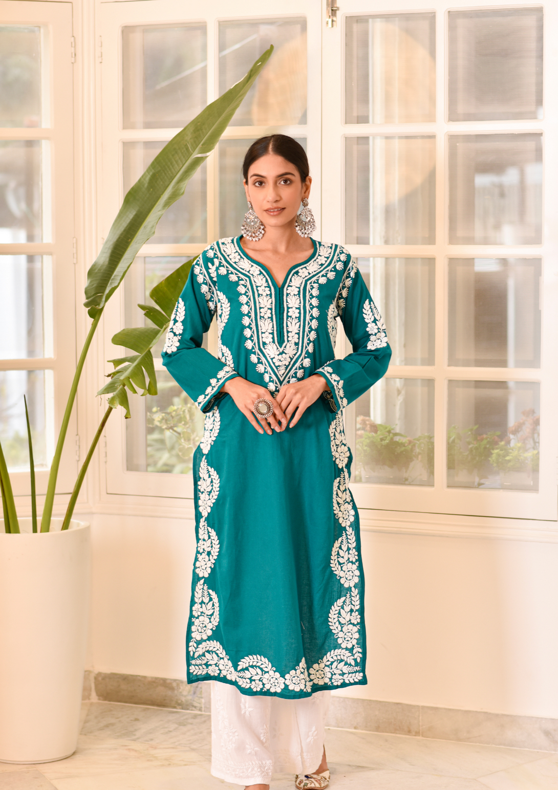 Akilah Straight Kurta with chikankari embroidery on cotton fabric in green colour.