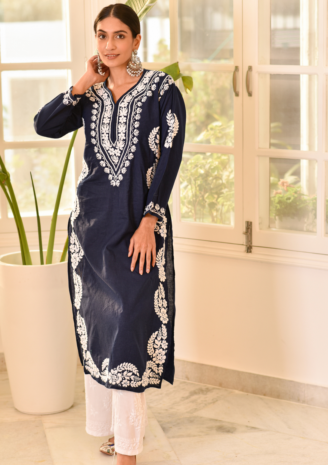 Akilah Straight Kurta with chikankari embroidery on cotton fabric in navy blue colour.