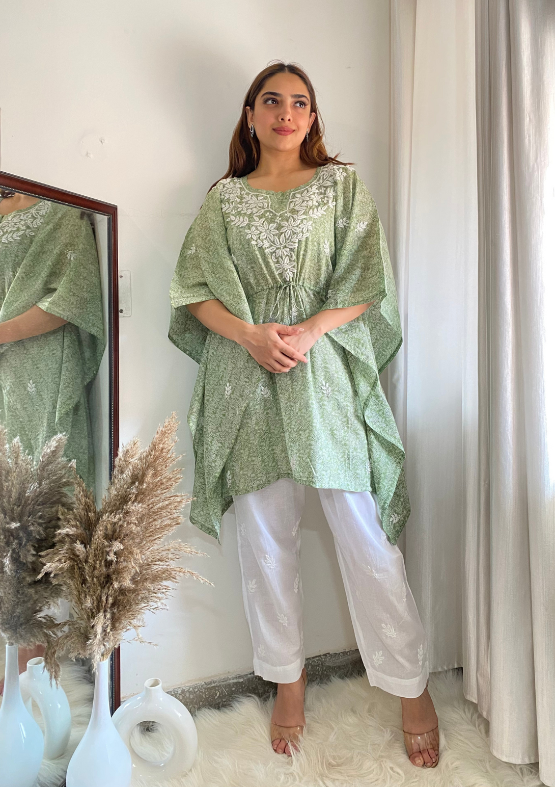 Amani kaftan set with chikankari embroidery and mulmul in green colour