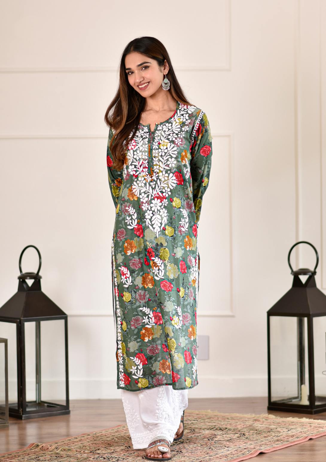 Nuha Straight Kurta Set with chikankari hand embroidery and mulmul fabric in dark green color.