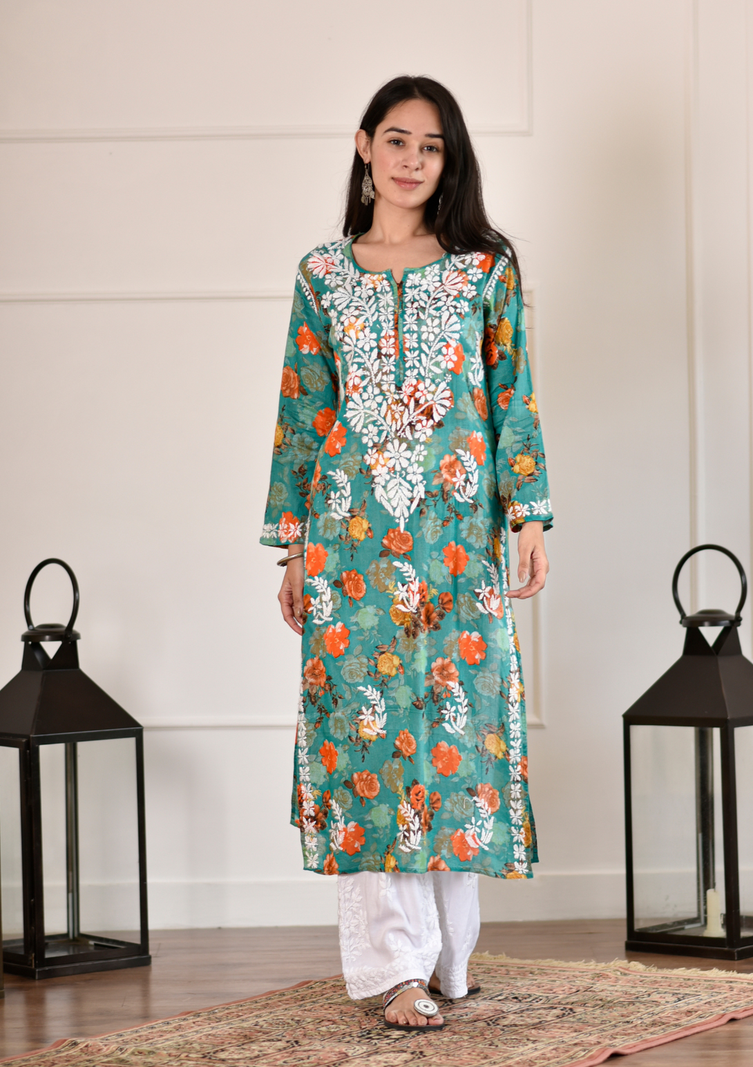 Nuha Straight Kurta Set with chikankari hand embroidery and mulmul fabric in teal green color.