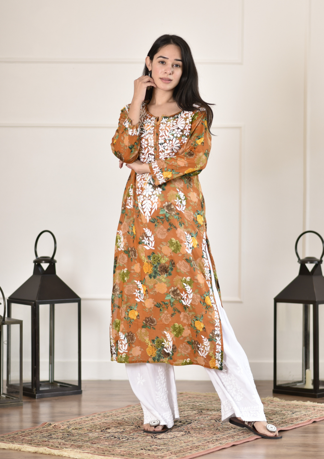 Nuha Straight Kurta Set with chikankari hand embroidery and mulmul fabric in mustard color.