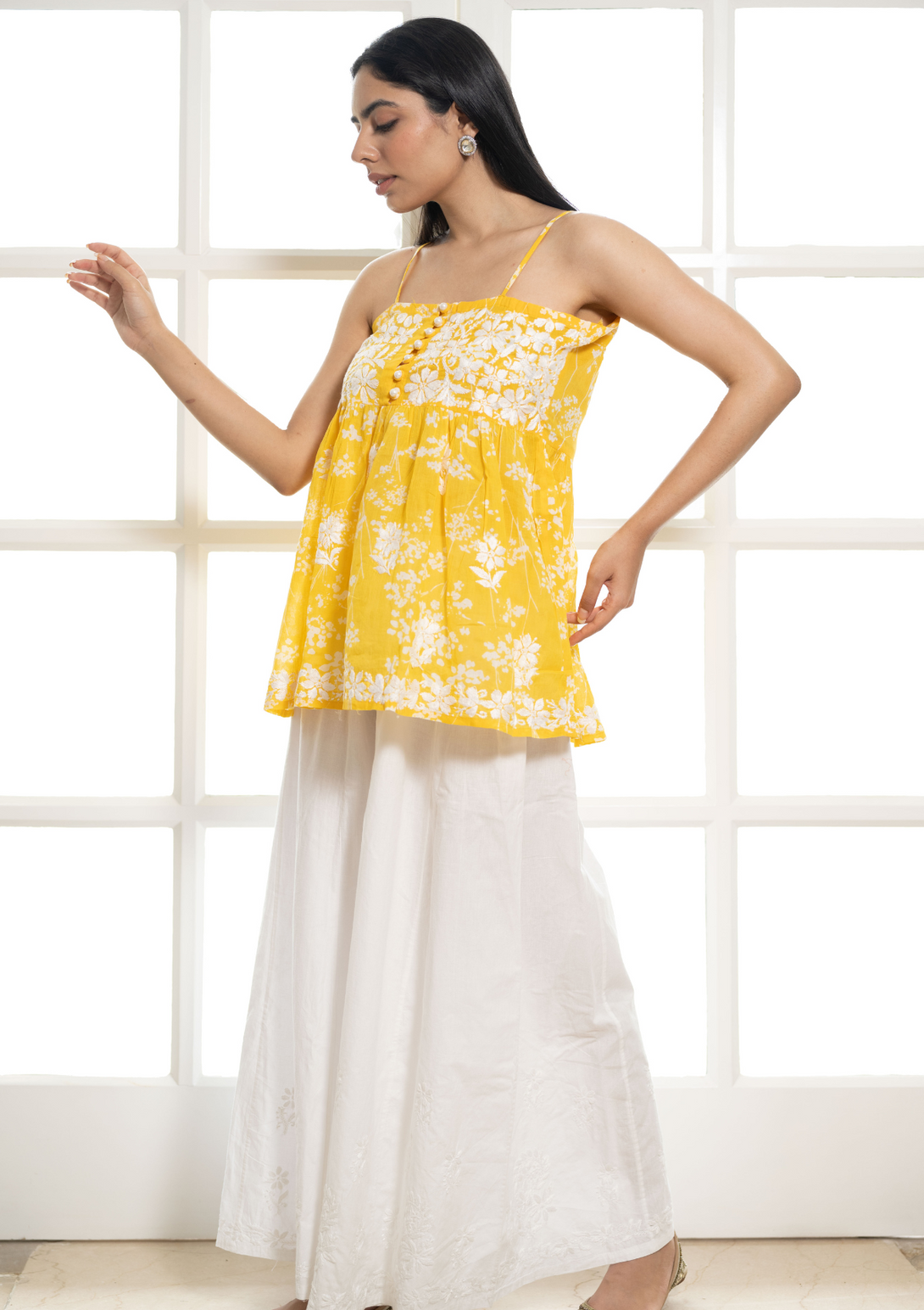 Zainab Mulmul Short Sleeveless Kurta in Yellow colour.