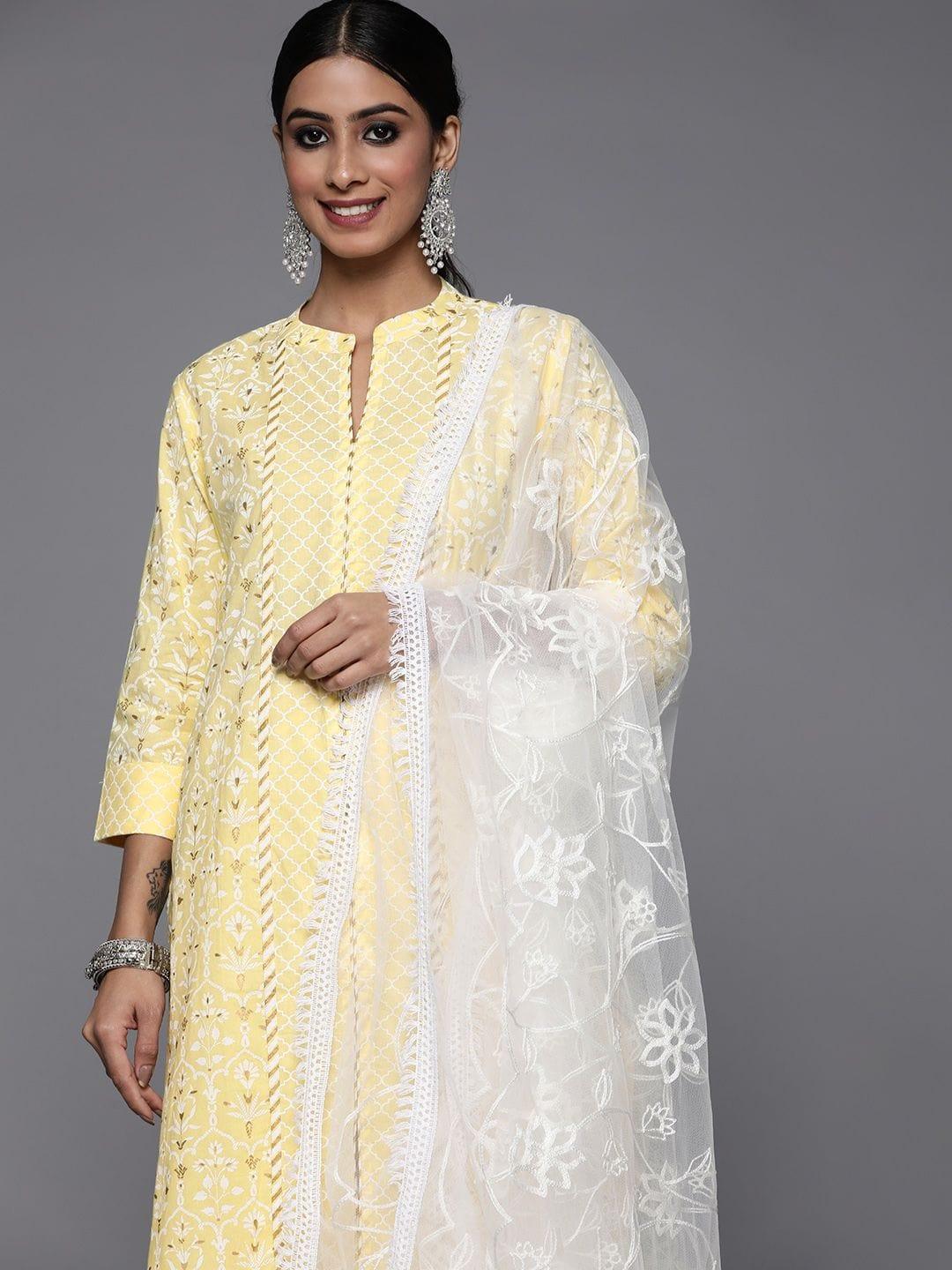 Varanga yellow printed kurta paired with straight printed bottom and contrast dupatta - Indiakreations