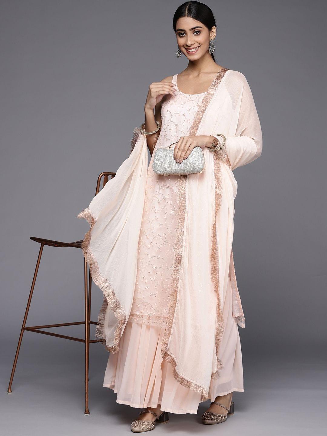 Varanga peach embroidered kurta paired with tonal sharara and dupatta - Indiakreations