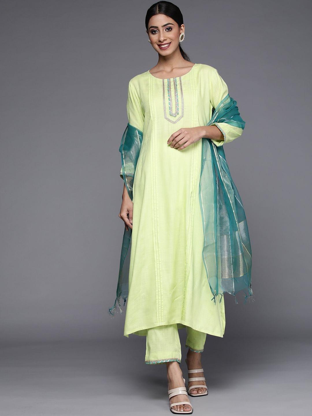 Varanga green kurta with lace embellishment paired with straight pant and dupatta - Indiakreations